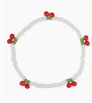 The Cherry Beaded Stretch Bracelet by Zad features small white beads with clusters of red and green cherry-like beads spaced evenly around this stylish stretch bracelet.