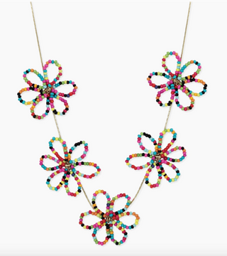 The Floral Festival Bead Flower Necklace by Zad features five vibrant, beaded flowers crafted from small, colorful beads and spaced along a thin cord.