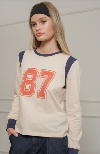87' Embroidered Long Sleeve Graphic Top